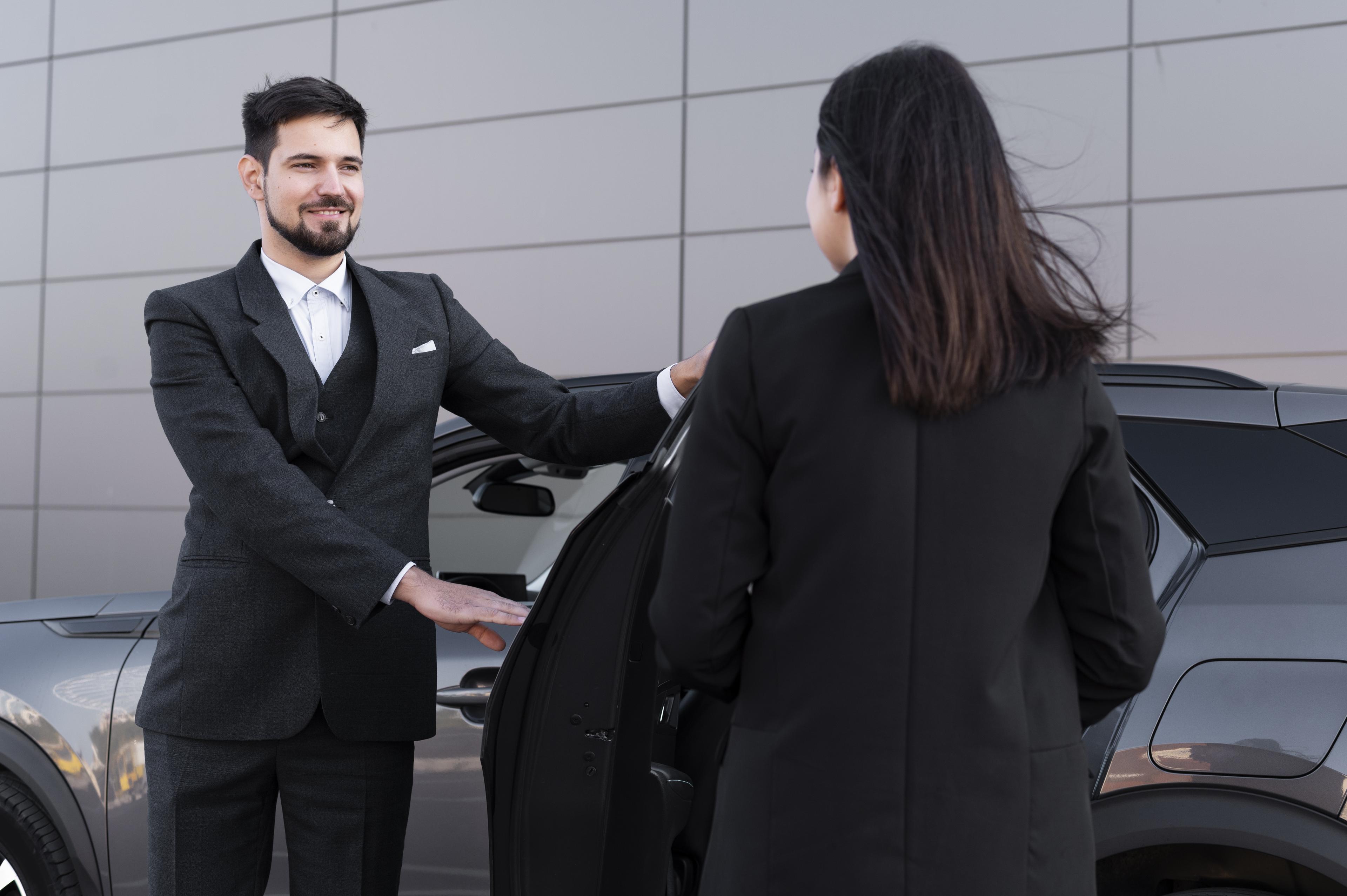 Valet returning car to guest
